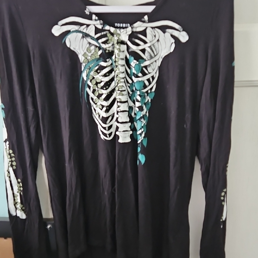 Torrid Black Long Sleeve Ribcage Graphic Top with Teal Floral Accents